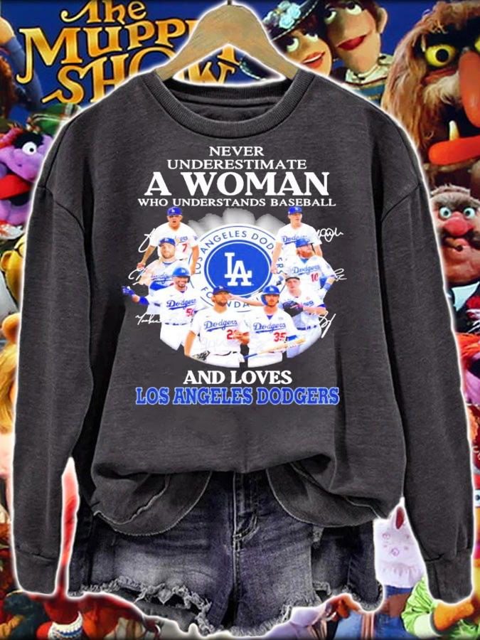 Never underestimate a woman who understands baseball and loves Los Angeles Dodgers signatures shirt sweatshirt